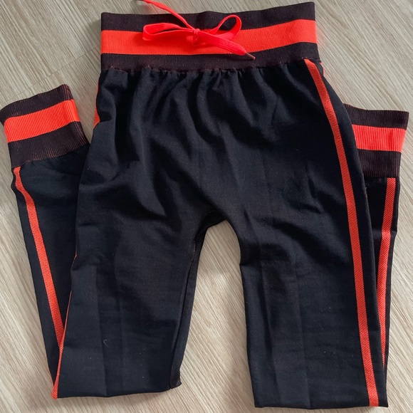 Fashion Nova Orange stripe leggings - Picture 2 of 2